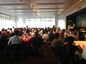 room filled with people sitting at tables